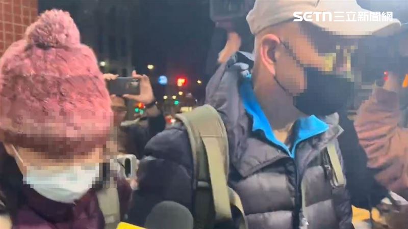 张文父母到警局作笔录的画面