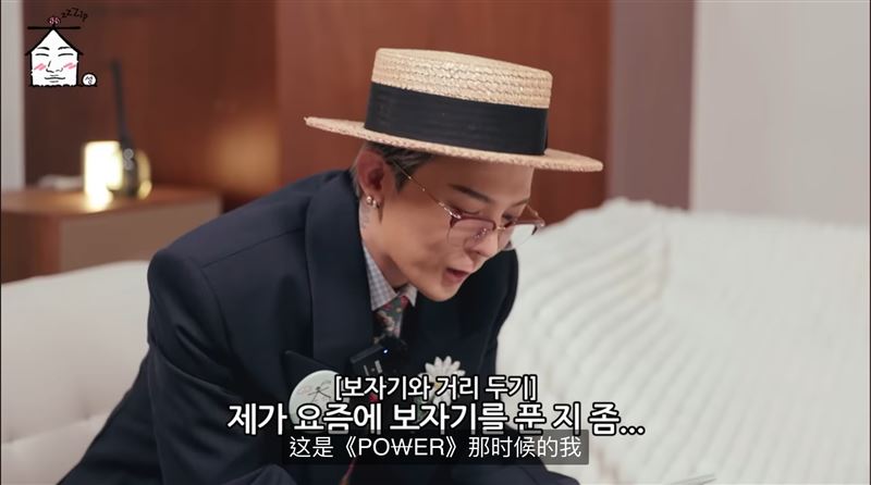 GD在節目中解釋絲巾用途